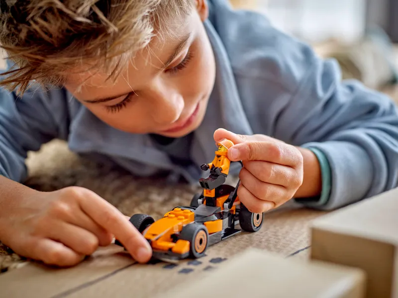 F1 Driver with McLaren Race Car